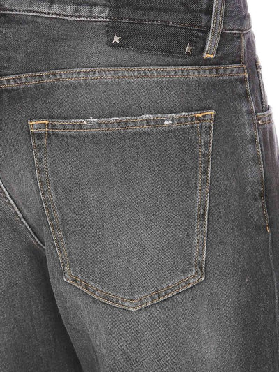 Jeans A Gamba Larga Con Effetto Delavè E Logo