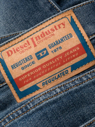 Jeans Slavati Con Logo