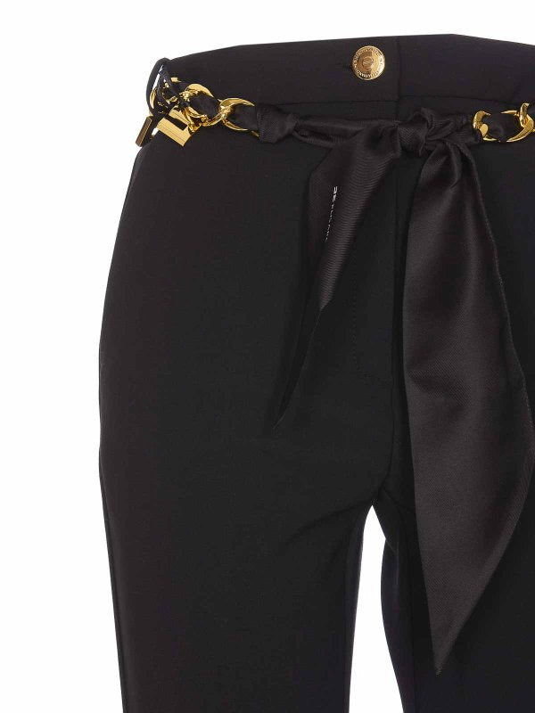 Pantaloni Neri Al Bottone Con Zip Logo