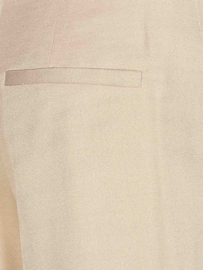 Pantaloni Beige Modello Ampio Con Zip E Ganci