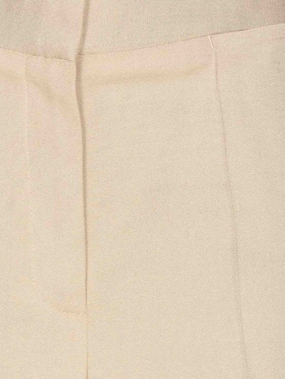 Pantaloni Beige Modello Ampio Con Zip E Ganci