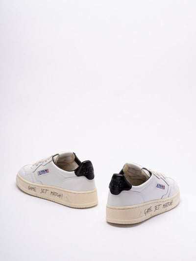 Sneakers In Pelle Colore Bianco E Nero